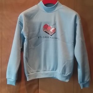 Pale blue Japanese sweatshirt with sleeping sushi design, M.